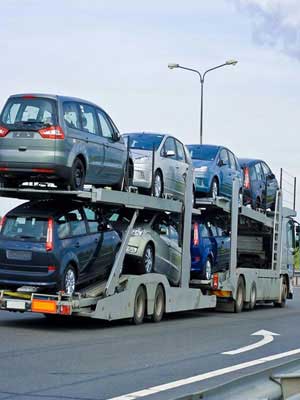 Moving cars in truck image